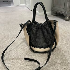 Proenza Schouler snakeskin and white leather two tone bag..